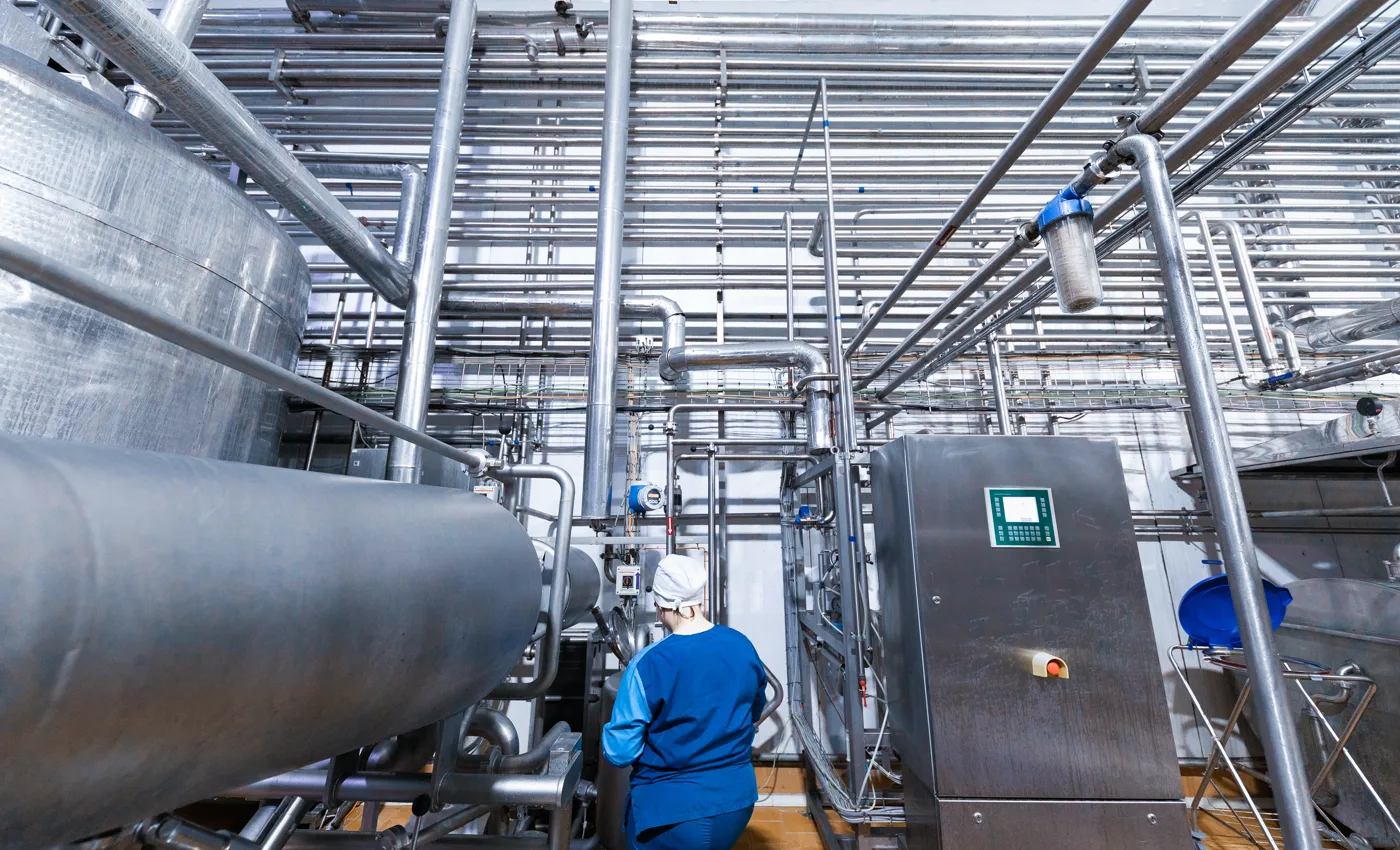 Stainless-steel process piping, valve manifolds and control panel in a high-purity delivery plant